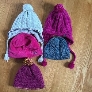 Lot of 4 The North Face hats and 1 Marmot hats. Small adult sizes/big kids